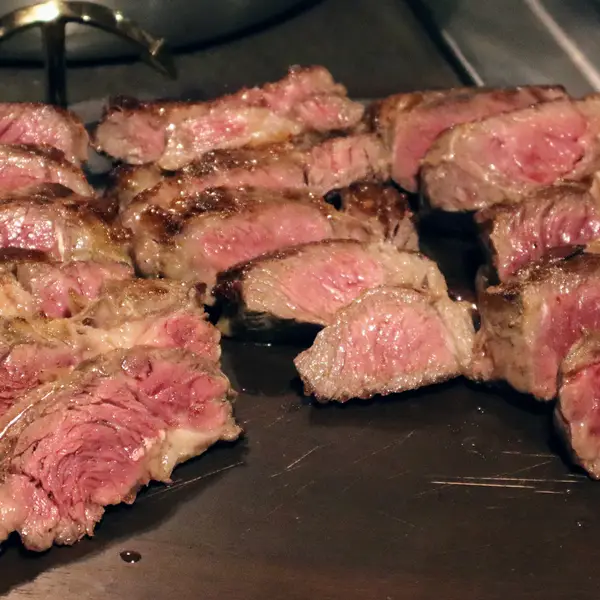 Sliced grilled steak cooked medium rare