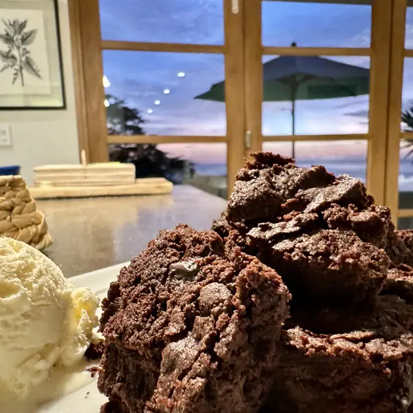 Homemade brownies with ice cream at sunset